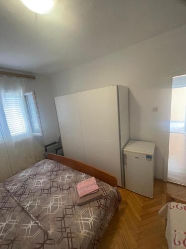 Postel nebo postele na pokoji v ubytování Ivica House