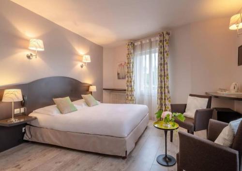 Postel nebo postele na pokoji v ubytování L10D10 Hotel