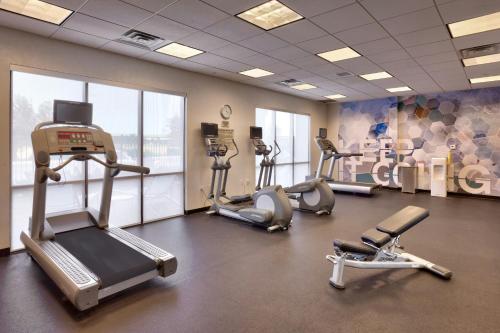 a gym with treadmills and cardio equipment in a room at SpringHill Suites by Marriott Rexburg in Rexburg