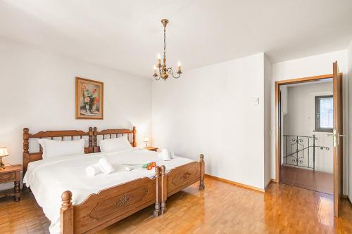 Ένα ή περισσότερα κρεβάτια σε δωμάτιο στο Casa Ana 1 - Losone Center - Happy Rentals