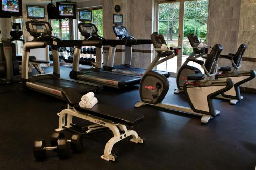 a gym with several cardio machines in a row at Westfields Marriott Washington Dulles in Chantilly