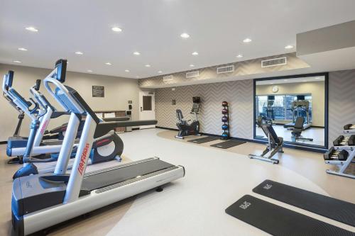 a gym with treadmills and elliptical machines at Residence Inn by Marriott Houston West/Beltway 8 at Clay Road in Houston
