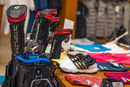 a bunch of shoes are lined up on a table at Korineum Golf & Beach Resort in Kérynia