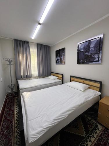 Cama o camas de una habitación en Cocon