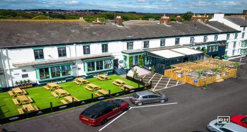 an aerial view of a building with a yard at Roker Hotel BW Premier Collection in Sunderland