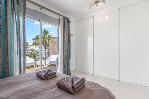 Giường trong phòng chung tại Villa Bahati