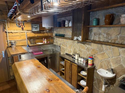 Η κουζίνα ή μικρή κουζίνα στο Štúdio Apartmán Pohoda Čingov Slovenský raj
