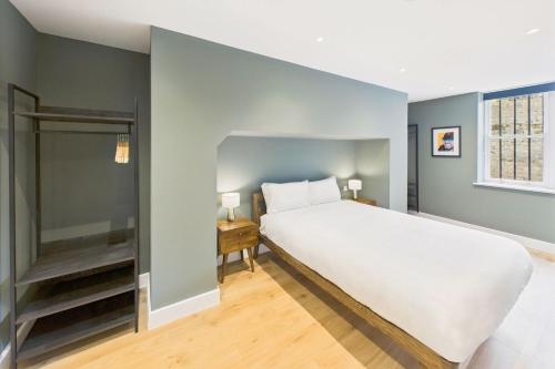 a bedroom with a large white bed and a window at Host & Stay - The Georgian Quarter at Catharine House in Liverpool