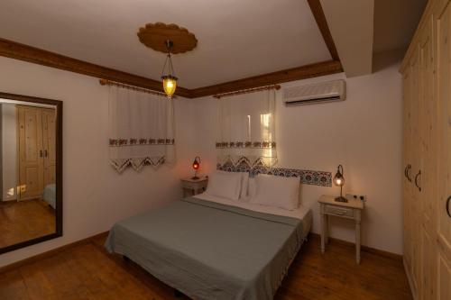 Katil atau katil-katil dalam bilik di guesthouse by west