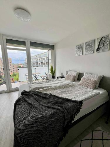 Postel nebo postele na pokoji v ubytování Apartmán Šantovka