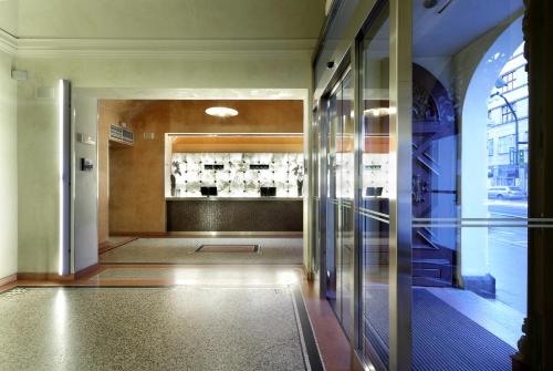 an entrance to a building with a glass door at Eurostars Thalia in Prague
