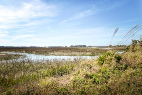 a marsh with water and tall grass at Charleston Oceanfront Villas 101 in Folly Beach