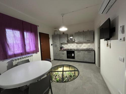 Кухня или мини-кухня в Il Paradiso Delle farfalle
