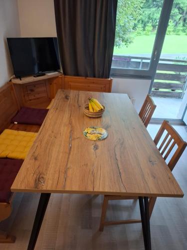 TV a/nebo společenská místnost v ubytování Appartement plus Pool, Morgins, Portes du Soleil