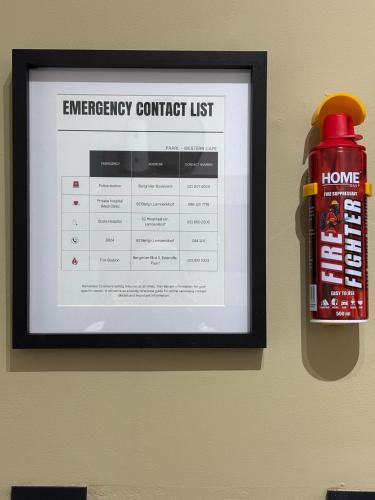 a picture of a emergency controller list on a wall at Inside Out Bliss in Paarl