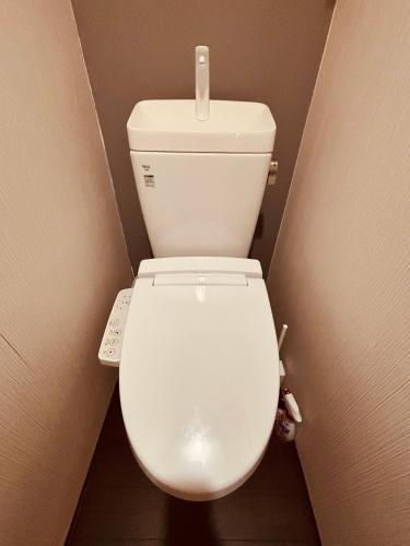 Koupelna v ubytování 栄の宿