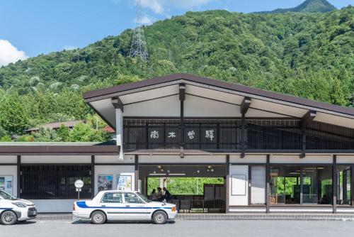 a police car parked in front of a building at YAMO Nagiso in Nagiso