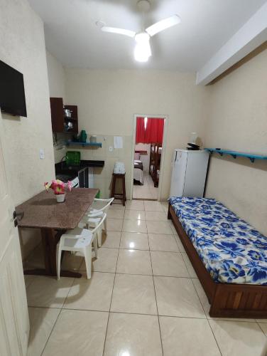 Ένα ή περισσότερα κρεβάτια σε δωμάτιο στο Residencial Luanda