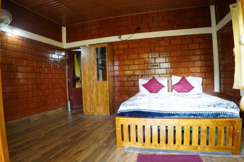 Φωτογραφία από το άλμπουμ του Lake View Cottage σε Ponnampet