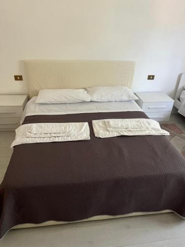 Postel nebo postele na pokoji v ubytování Flaminia guesthouse