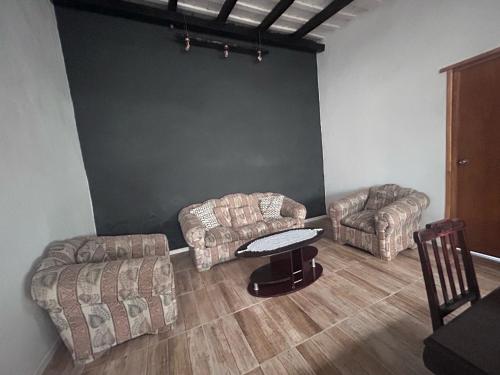 Posezení v ubytování Aparthouse-Compartida!