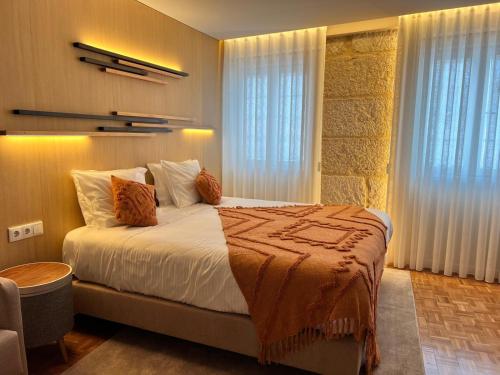 Кровать или кровати в номере Raiano Guest House