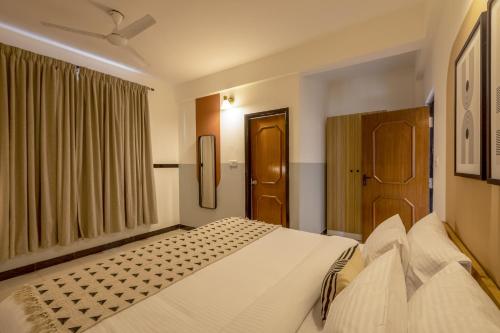 Olive Hotel Palace Road by Embassy Groupにあるベッド