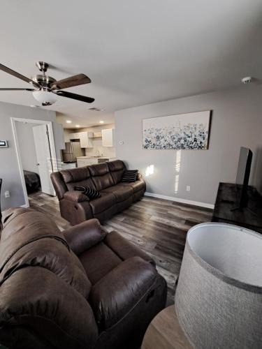 a living room with a couch and a table at Illini Hideaway in Streator