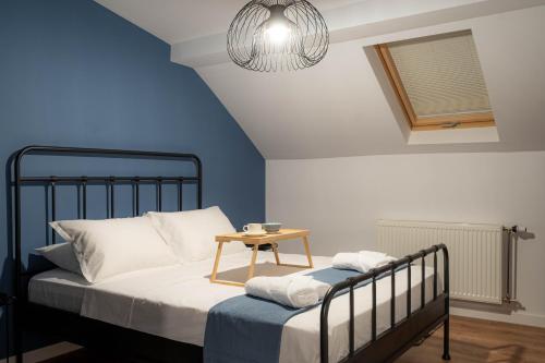 Ένα ή περισσότερα κρεβάτια σε δωμάτιο στο Stayna Apartments