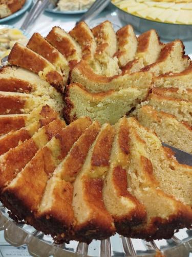 a close up of a cake on a cooling rack at Camaçari Plaza Hotel in Camaçari
