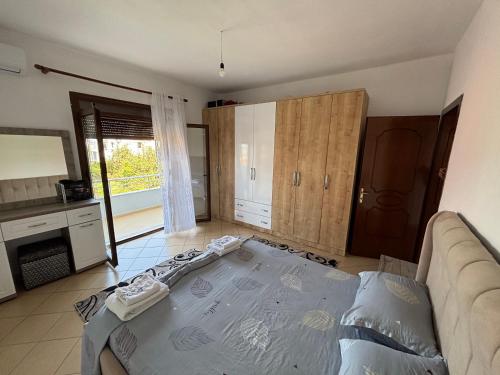 Ένα ή περισσότερα κρεβάτια σε δωμάτιο στο Lusha Home