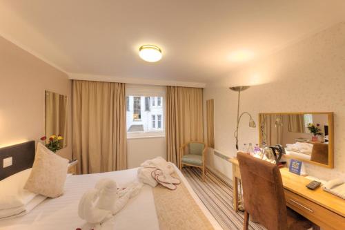 Muthu Queens Hotel, Obanにあるベッド
