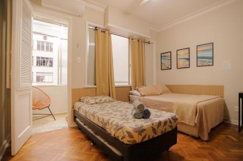 Postel nebo postele na pokoji v ubytování 360 Copa Beach Posto 2 By SUHCasa