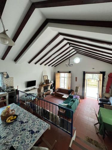 a living room with a couch and a table at Casa da Lua in Erra
