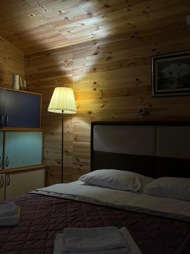 Postel nebo postele na pokoji v ubytování Sunset apartments