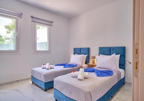 Postel nebo postele na pokoji v ubytování Drastis Escape Villas