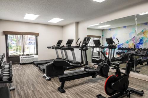 a gym with treadmills and ellipticals in a room at Hyatt Place San Antonio Riverwalk in San Antonio