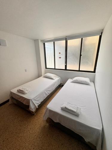 Postel nebo postele na pokoji v ubytování Apartment 303