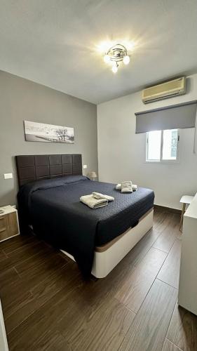 a bedroom with a large bed in a room at Relaxing Villa Las Torres in Adeje