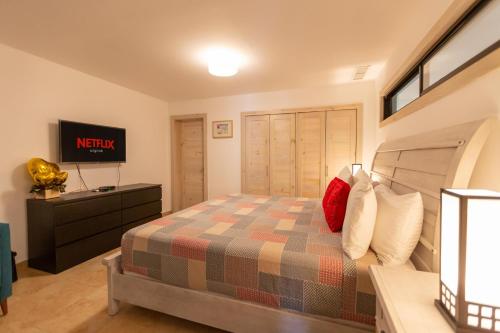 Marbella Juan Dolio Beachfrontにあるベッド