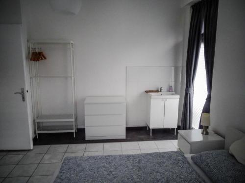 Postel nebo postele na pokoji v ubytování Hubertus II