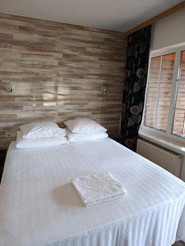 Postel nebo postele na pokoji v ubytování Urusel Hostel