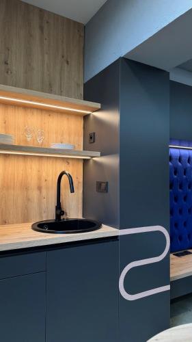 Dapur atau dapur kecil di Spill Apartments