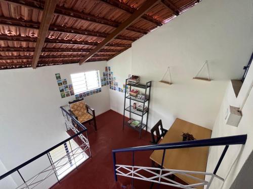an overhead view of a room with a staircase at MyYearlyStay in Udupi - Colonial in Udupi