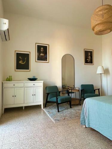 Ένα ή περισσότερα κρεβάτια σε δωμάτιο στο Casa di Bona S