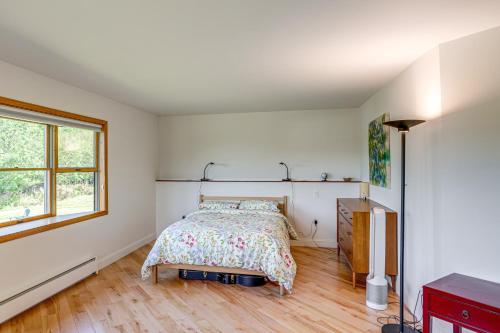 a bedroom with a bed and a window at Private Hilltop Retreat Near Windham Mountain in Windham