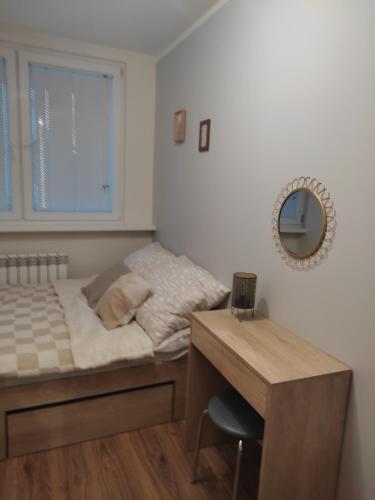 Postel nebo postele na pokoji v ubytování Apartament w pobliżu plaży