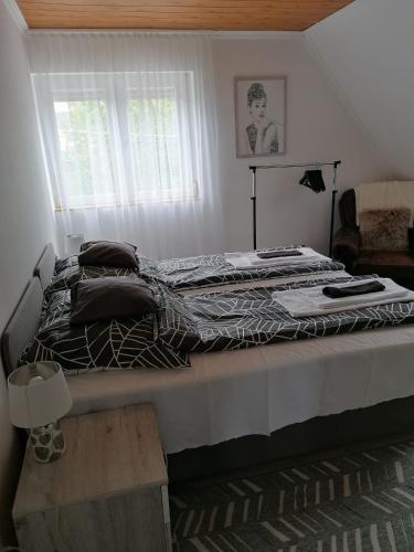 LiLu Apartmanにあるベッド
