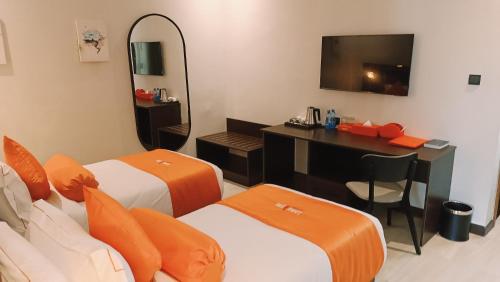 Cama o camas de una habitación en Lemaiyan Suites