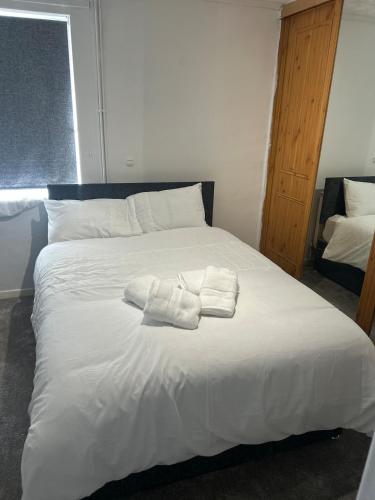 Katil atau katil-katil dalam bilik di 2BR House Near Excel, O2, City Airport, 3 DLR Lines